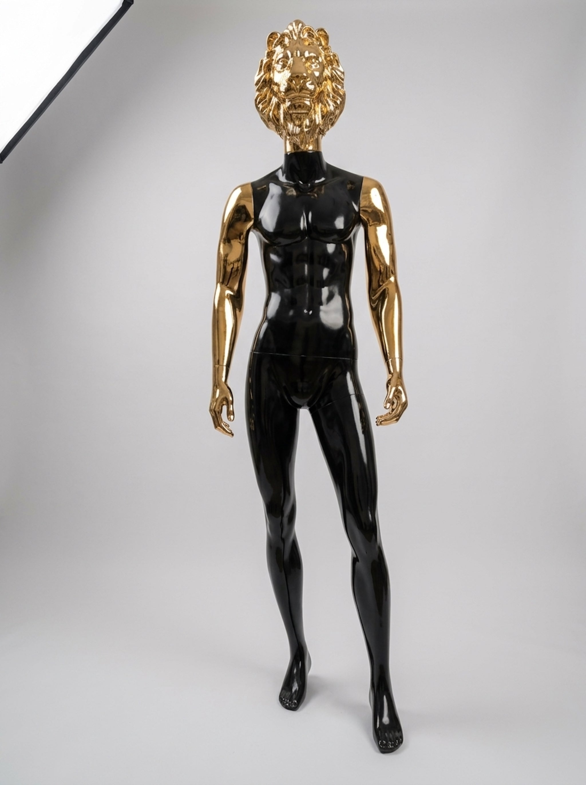 Male High-Gloss Black Mannequin with Gold Lion Head and Arms