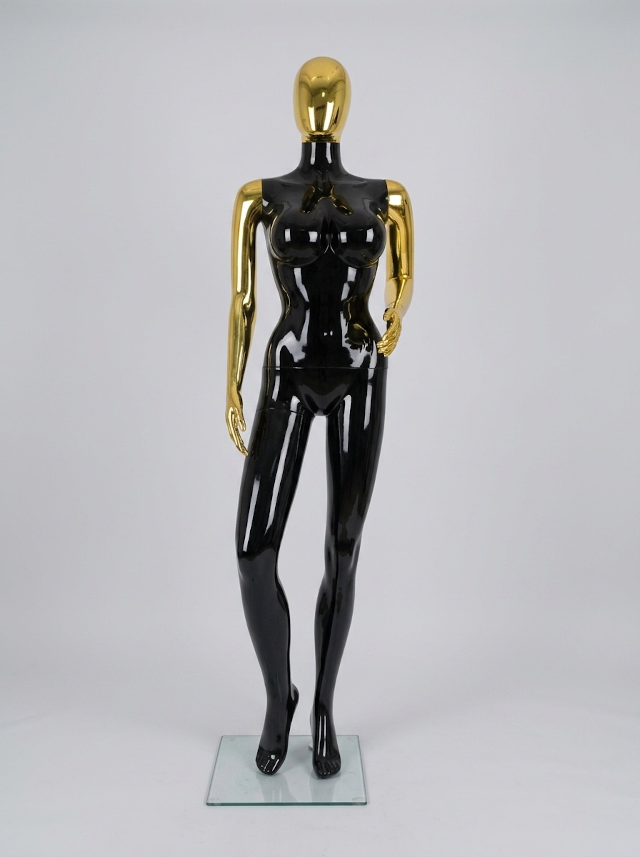 Female High-Gloss Black Mannequin with Metallic Gold Accents