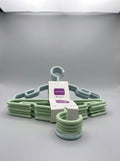 Mint green kids hangers set of 5 by Xuezhousun