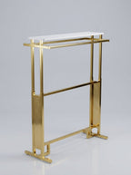 Height-Adjustable Gold Garment Rack with Integrated Tabletop